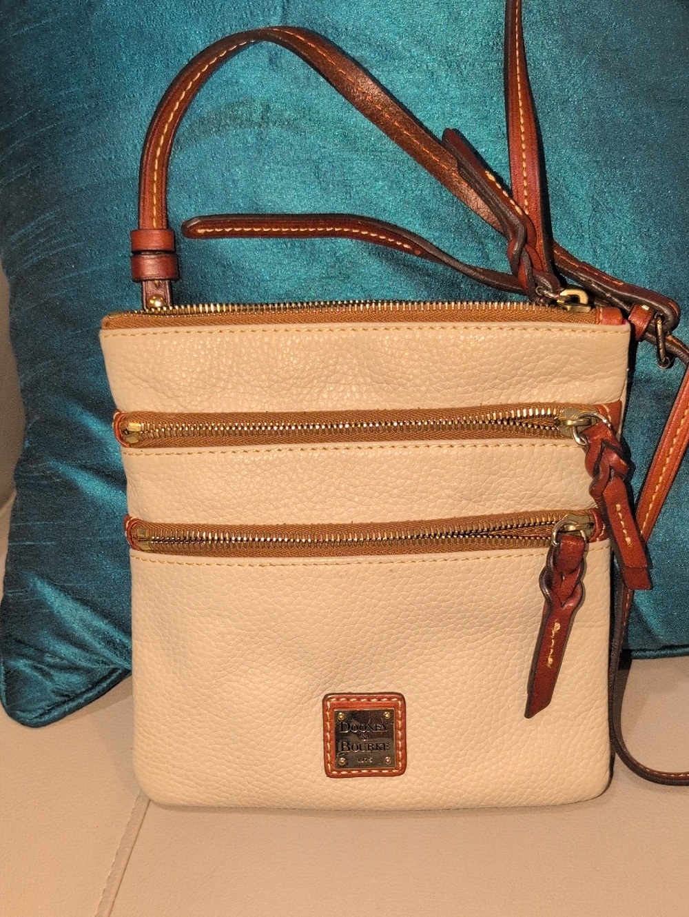 Dooney & Bourke Cream Pebbled Leather  Triple Zip Crossbody with Brown Leather T